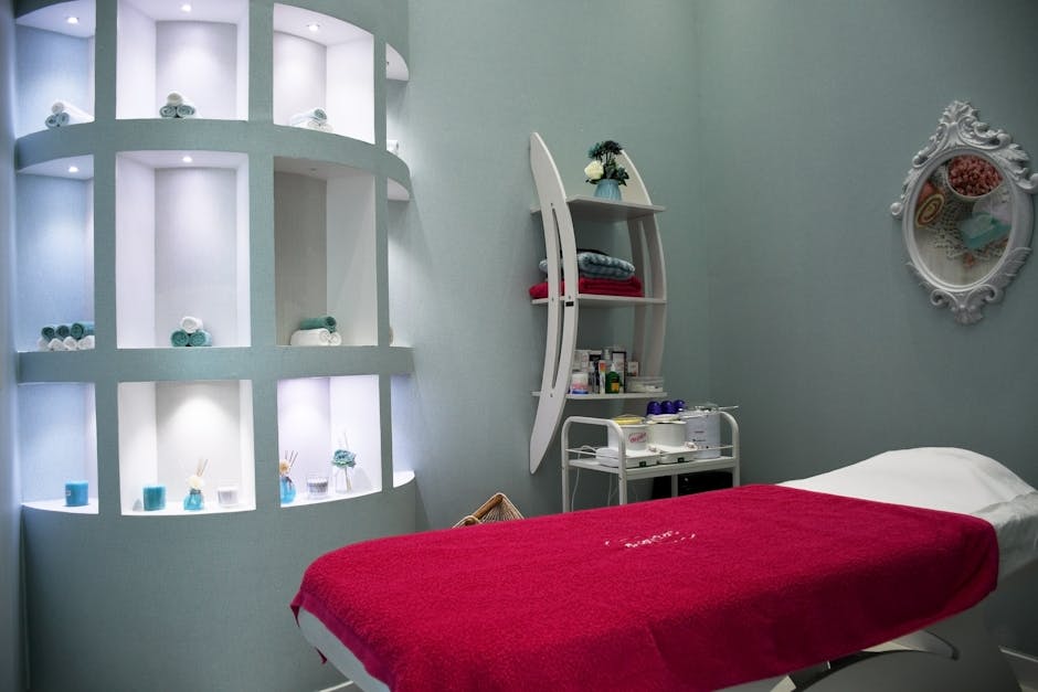 Modern spa room in Abu Dhabi with stylish decor, ambient lighting, and luxurious fittings