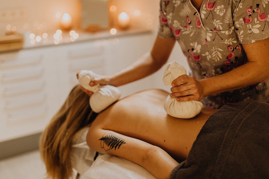 Enjoy a soothing spa experience with a relaxing massage using herbal compresses for ultimate relaxation